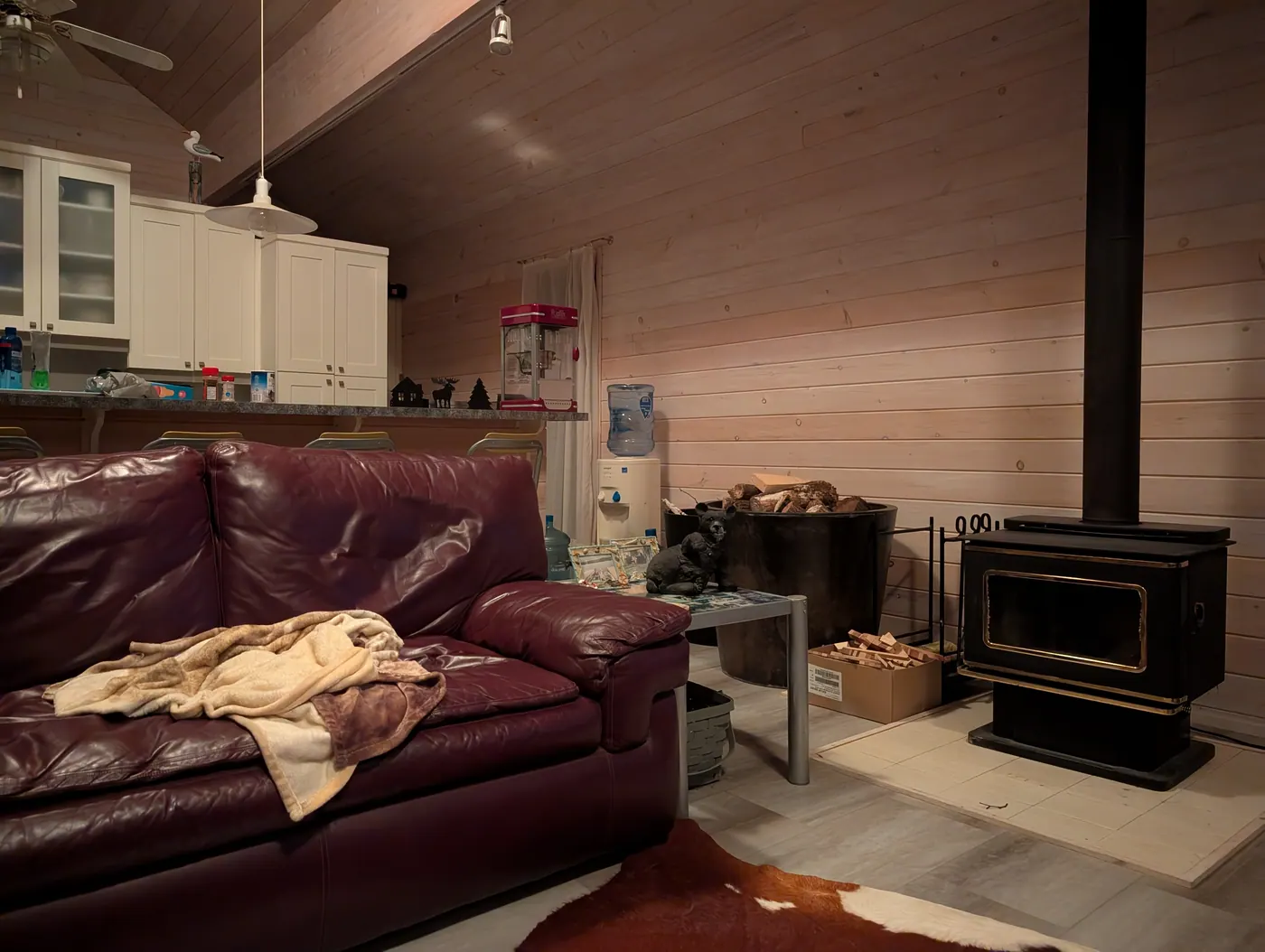 Seating in the main room beside the wood stove.